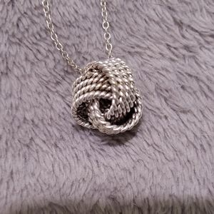 Sterling silver knotted necklace.